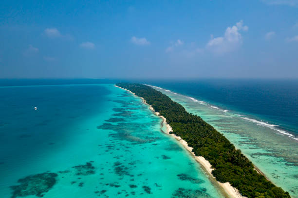 istock Maldives aerial view panorama landscape white sand beach 1068433450