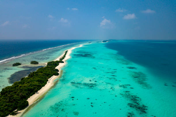 istock Maldives aerial view panorama landscape white sand beach 1068433484