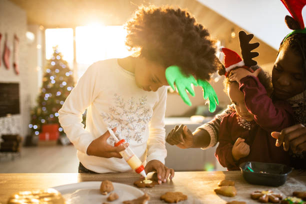 istock Family decorating Christmas cookies 1068433742