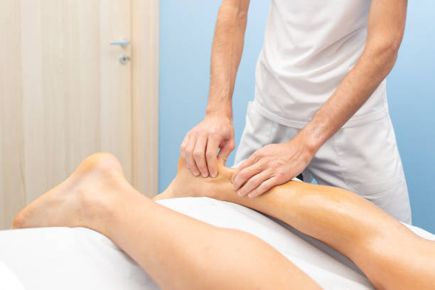 istock Physiotherapist during an Achilles tendon treatment 1068435610