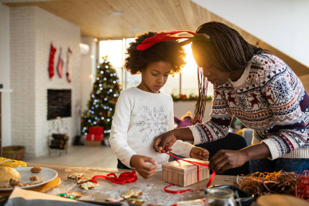 istock Wrapping Up Gingerbread Cookies In Gift 1068435822