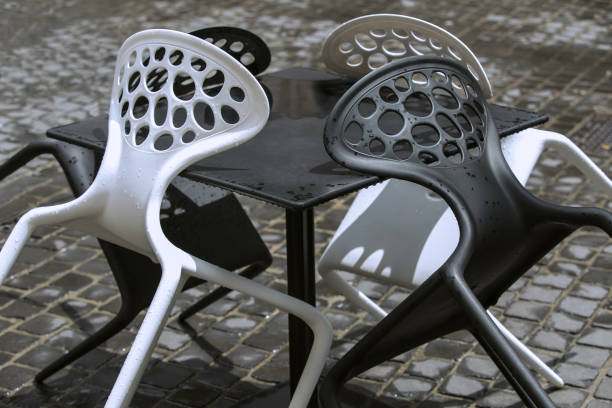 istock chairs in a street cafe 1068439884