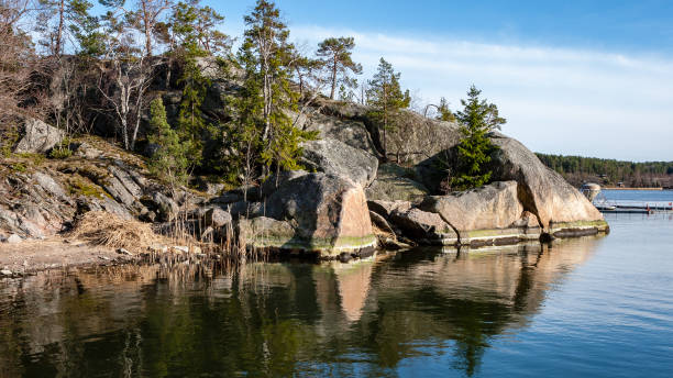 istock rocky coastline in Finland with few pine trees 1068442504