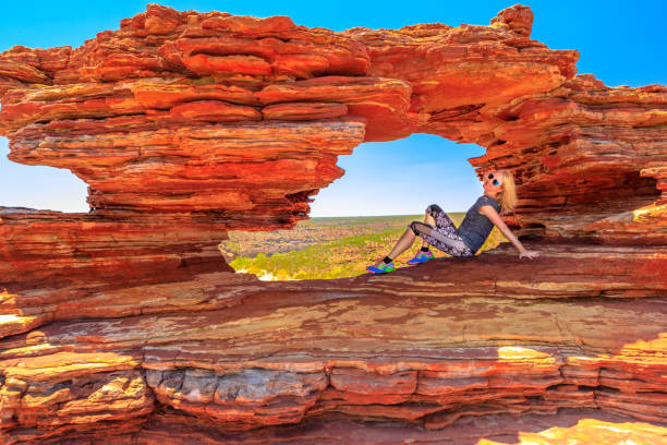 istock Kalbarri woman Nature's Window 1068443544