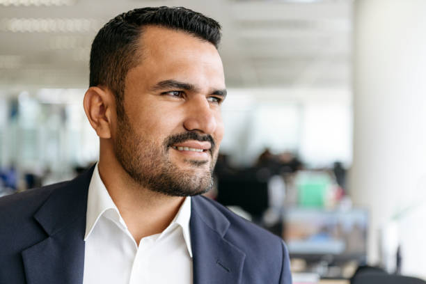 istock Confident businessman in his 30s looking away 1068445160