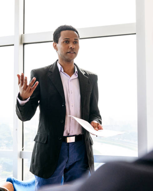 istock Confident Brazilian businessman delivering speech 1068445286