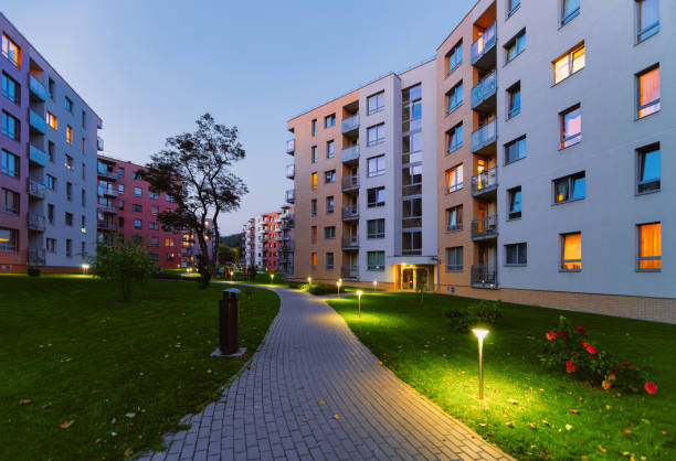 istock Modern residential apartment flat home building complex block outdoor 1068447564