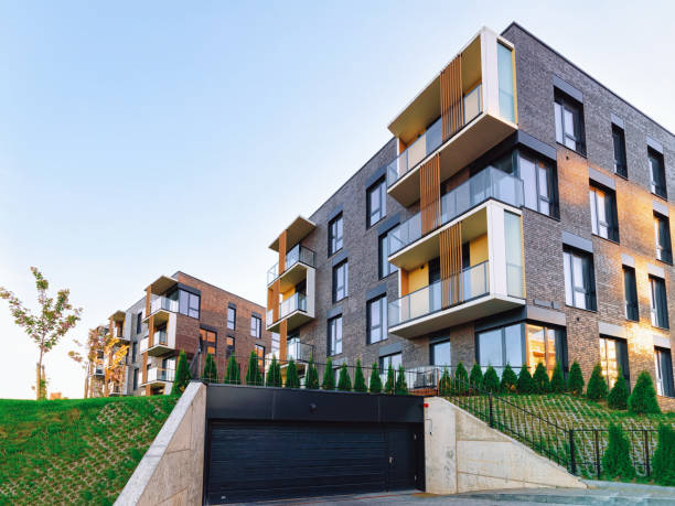 istock Modern residential home apartment building architecture with garage 1068448824