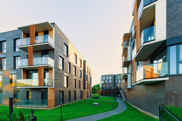 istock Modern residential house complex with outdoor facilities 1068448830