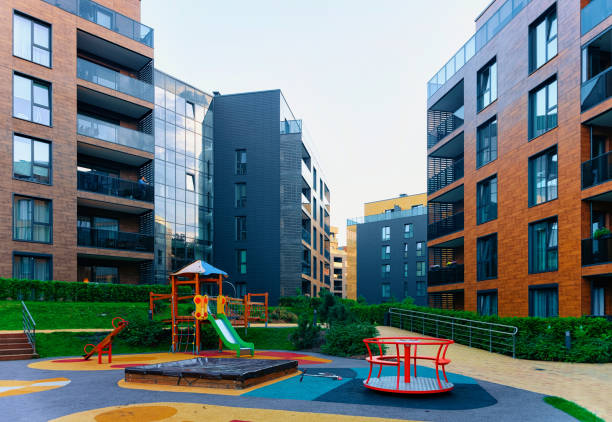 istock Residential apartment building architecture children playground 1068449190