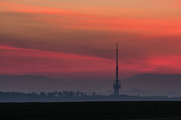 istock Sunrise with Hostalkovice transmitter, Ostrava with mountains on the background, Czech Republic 1068452534