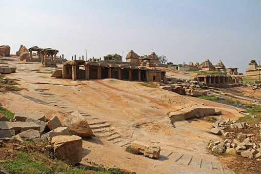 An ancient temple complex Hemakuta hill in Hampi, Karnataka, India. Unesco World Heritage Site. The famous tourist destination from GOA.