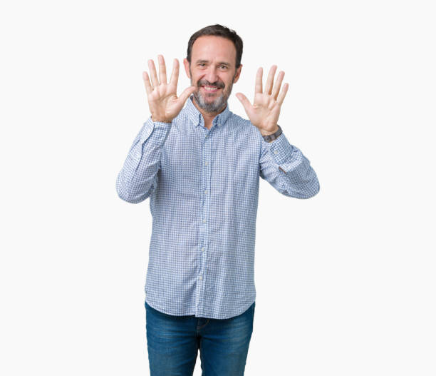istock Handsome middle age elegant senior man over isolated background showing and pointing up with fingers number ten while smiling confident and happy. 1068469564