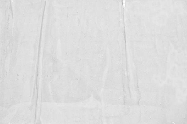istock Blank white old ripped torn paper crumpled creased posters grunge textures backdrop backgrounds surface placard 1068477108