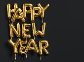 Happy New Year gold text on black background, golden foil balloon typography