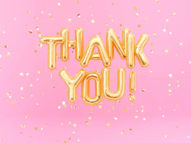 Photo of Thank You text gold foil balloons on pink background