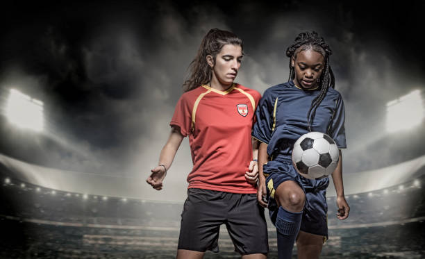 istock Two Female Soccer Players 1068489722