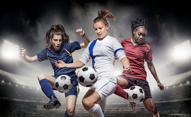 istock Three Female Soccer Players 1068493120