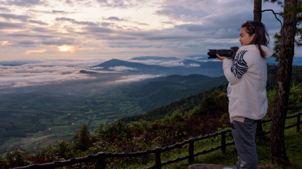 istock Woman are looking at the beautiful nature 1068496422