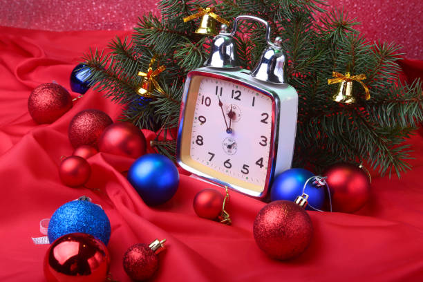 istock Christmas clock. New Year's Decoration with christmas balls and tree. Celebration Concept for New Year. 1068508366
