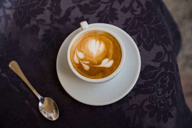 coffee in white cup, on terrace table - koffie imagens e fotografias de stock
