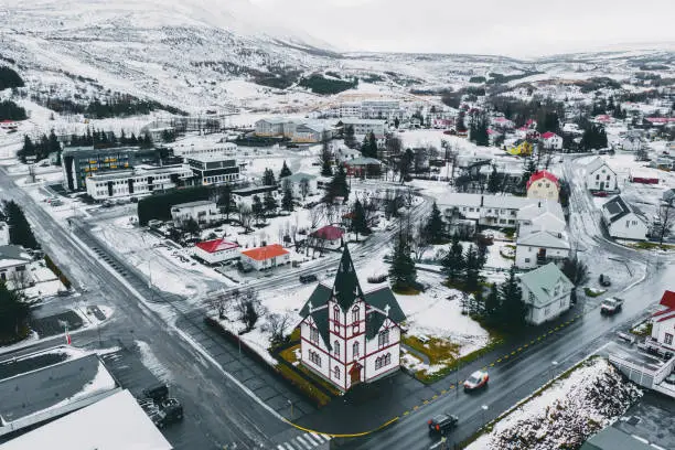 Scenic aerial view of  church in Husavik town in winter