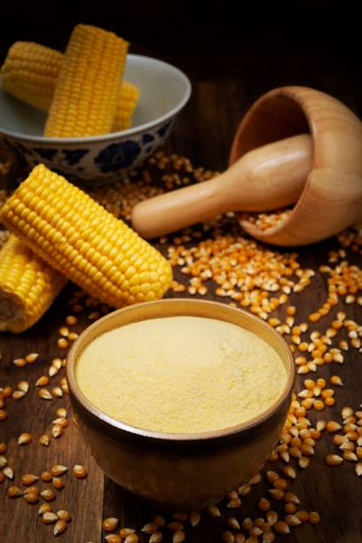 istock Sweet yellow corn and flour over rustic pine wood table 1068537956