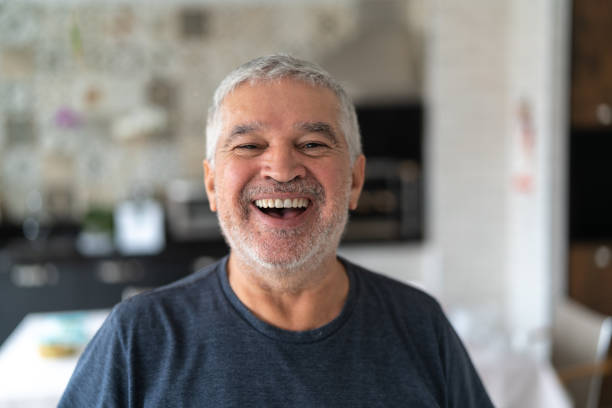 istock Senior Man Portrait at Home 1068538302