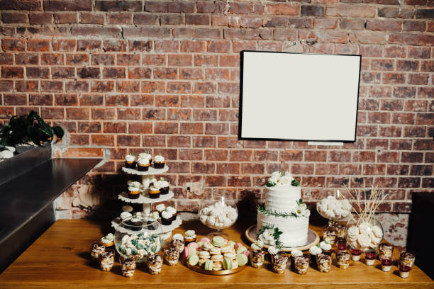 istock Wedding catering, table with modern desserts and cupcakes. 1068542504