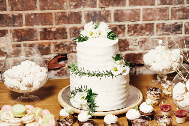 istock Wedding catering, table with modern desserts and cupcakes. 1068542580