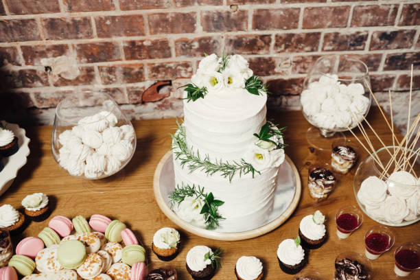 istock Wedding catering, table with modern desserts and cupcakes. 1068542614