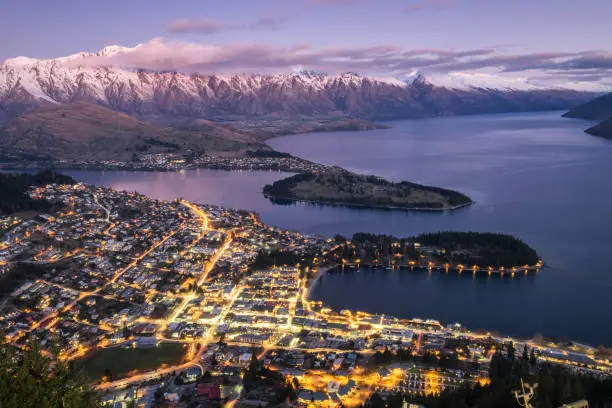 Aerial view of twilight Queenstown. Suitable for tour image. This is the most popular and famous tourist destination and attraction in New Zealand. This image is taken from hill top.