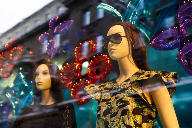 istock Shop window with mannequins 1068552680