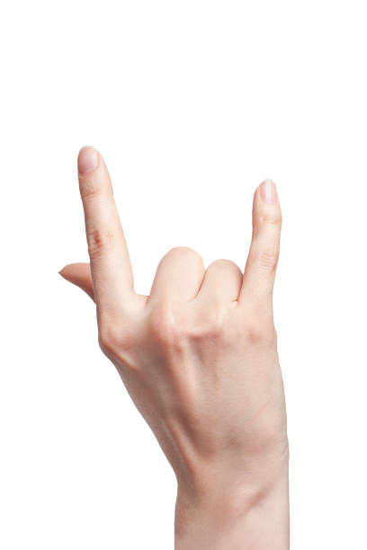 Woman hand with Rock and Roll sign isolated on white background Woman hand with Rock and Roll sign isolated on white background. rocker nails stock pictures, royalty-free photos & images