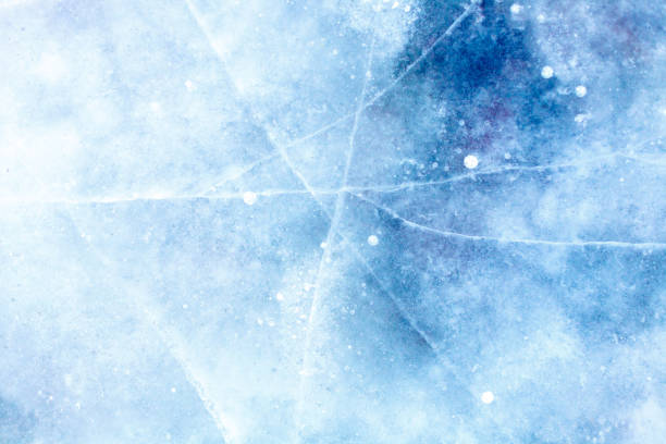 istock texture of a beautiful blue ice with cracks 1068575148
