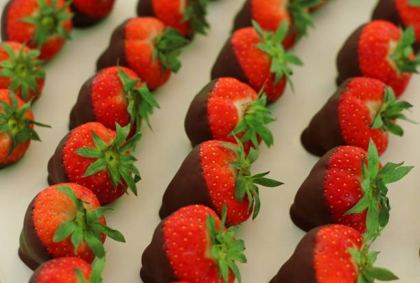 istock chocolate coated strawberry 1068575428