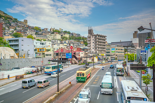 NAGASAKI - 13 APRIL : Traffic in downtown city center of Nagasaki in Japan on April 13, 2018