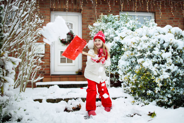 child shoveling winter snow. kids clear driveway. - 16707 imagens e fotografias de stock