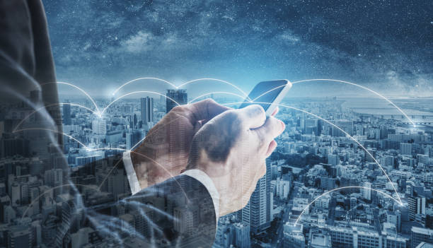 istock Double exposure businessman using mobile smart phone, and network connection technology in the city. Business network, mobile networking and internet connection 1068597540