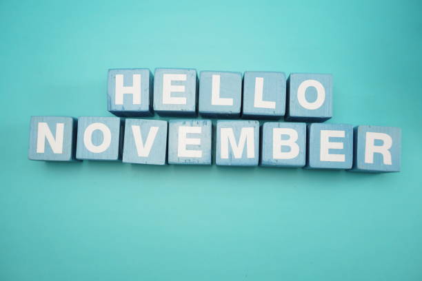 istock hello November alphabet letters on blue background 1068617818