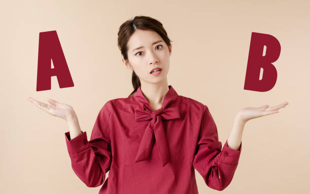 Young woman conparing A with B.