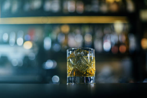 istock Old Fashioned whiskey coctail, server with oranges close up 1068622620