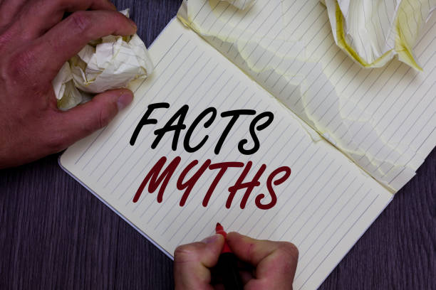 istock Word writing text Facts Myths. Business concept for work based on imagination rather than on real life difference Man holding marker notebook crumpled papers ripped pages mistakes made. 1068629736