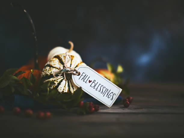 istock Pumpkin assortment still life and blessings greeting 1068633314