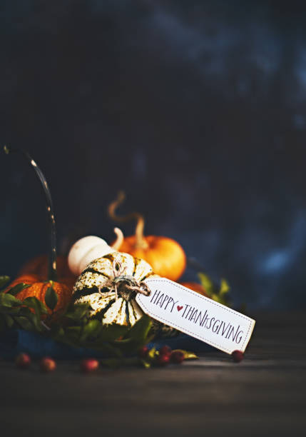 istock Pumpkin assortment still life and Happy Thanksgiving message 1068633392