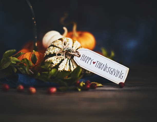 istock Pumpkin assortment still life and Happy Thanksgiving message 1068633414