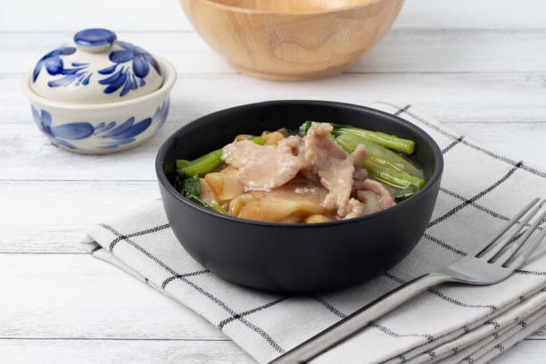 istock Fried noodle with pork and Chinese broccoli 1068636842