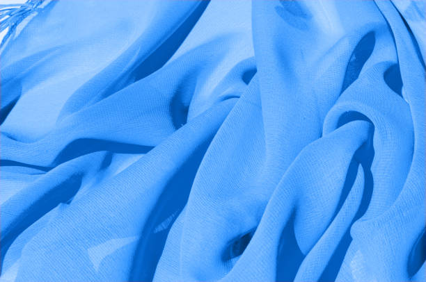 istock Background texture, pattern. Azure Blue Silk Twill. Here is a deluxe azure blue silk twill perfect for a vast array of applications. Almost as soft as a cloud, this remarkable silk has a supreme drape 1068644472