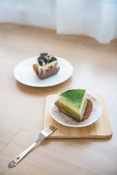 istock Tasty cake on wood background 1068646574