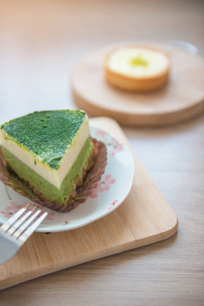 istock Tasty cake on wood background 1068646598